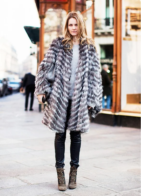 black leather skinnies lace up booties ankle boots fur coat striped fur coat via stockholm street style